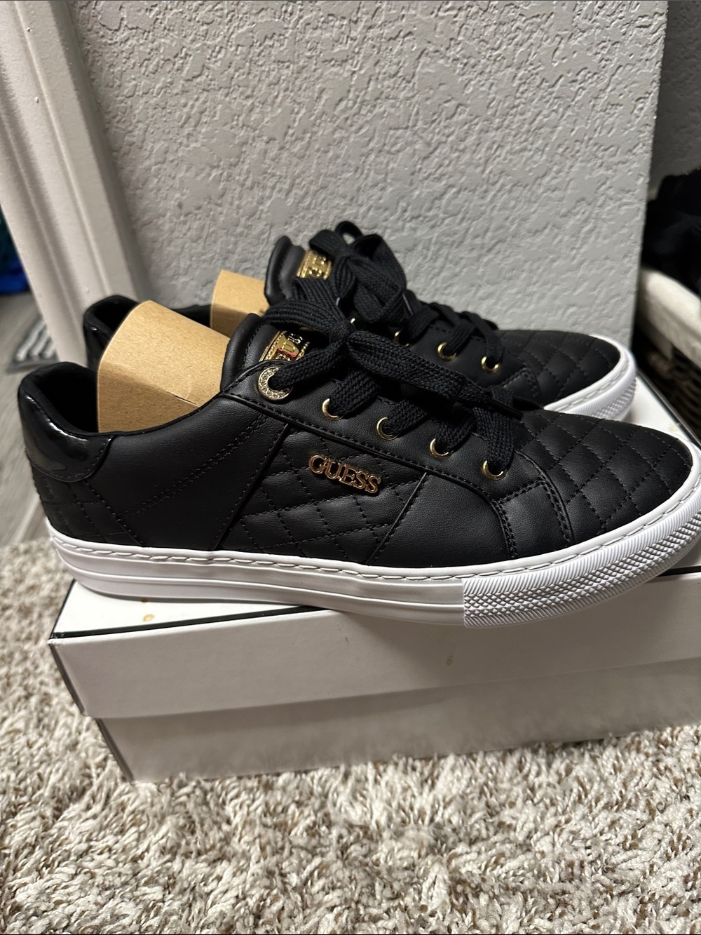 GUESS Black Quilted Sneakers with Gold Logo